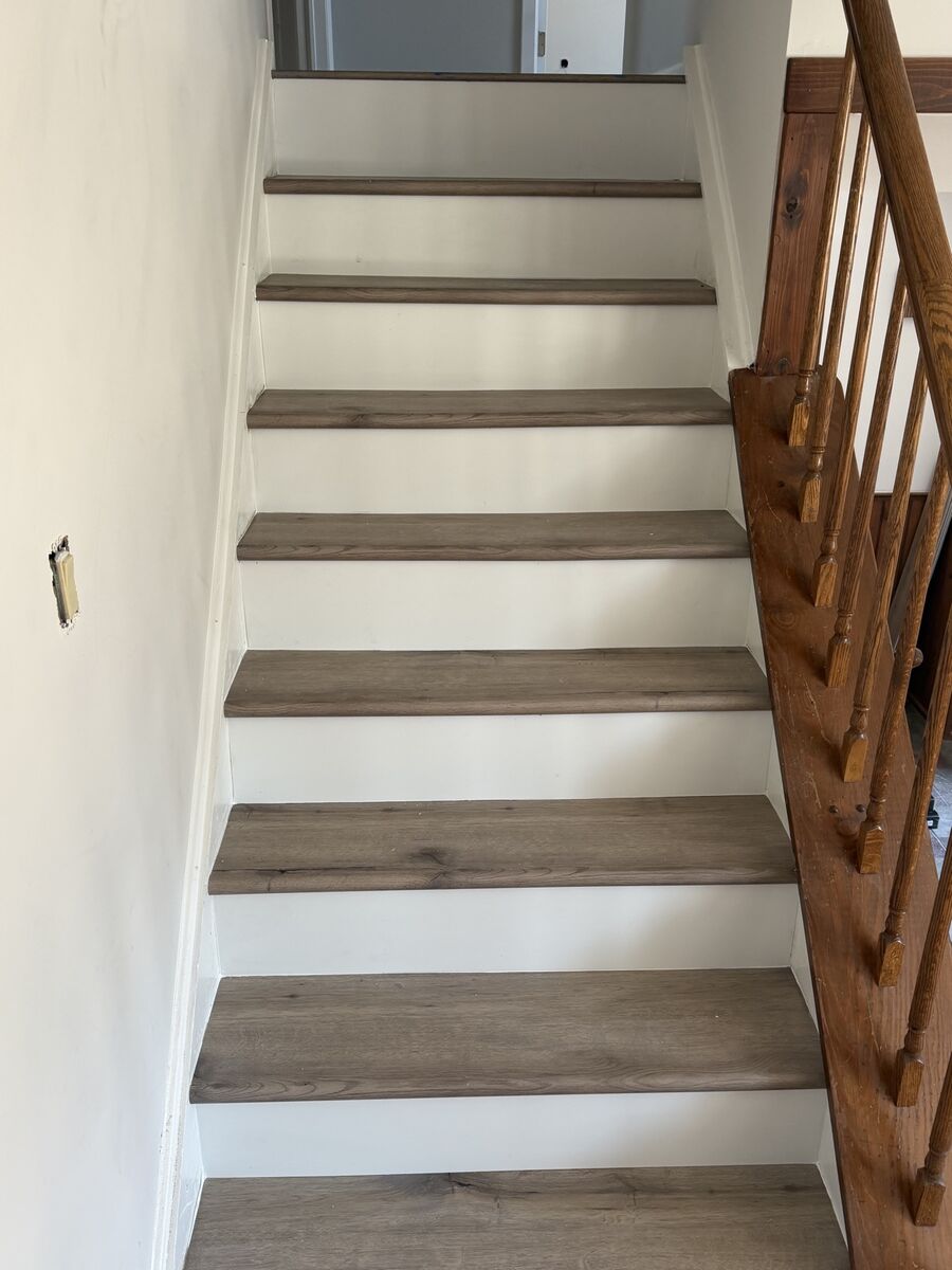 Finished staircase with matching hardwood treads